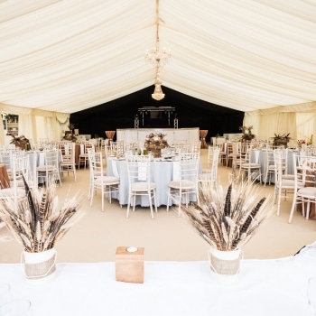 Wedding marquee interior with table settings