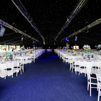 Marquee with client’s corporate colours and star cloth ceiling