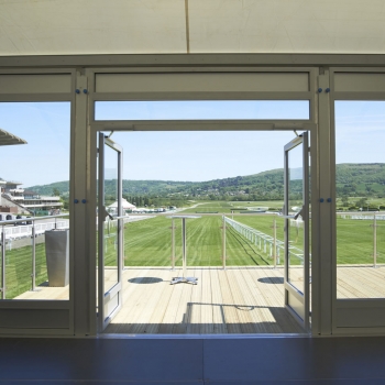 Fews Marquees used a bespoke wooden entrance featuring glass panel railings